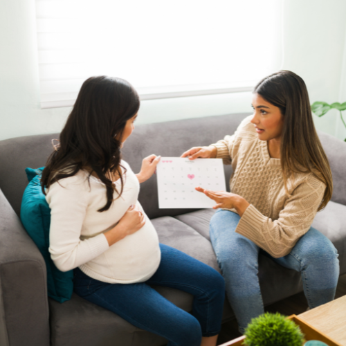 Childbirth educator with client