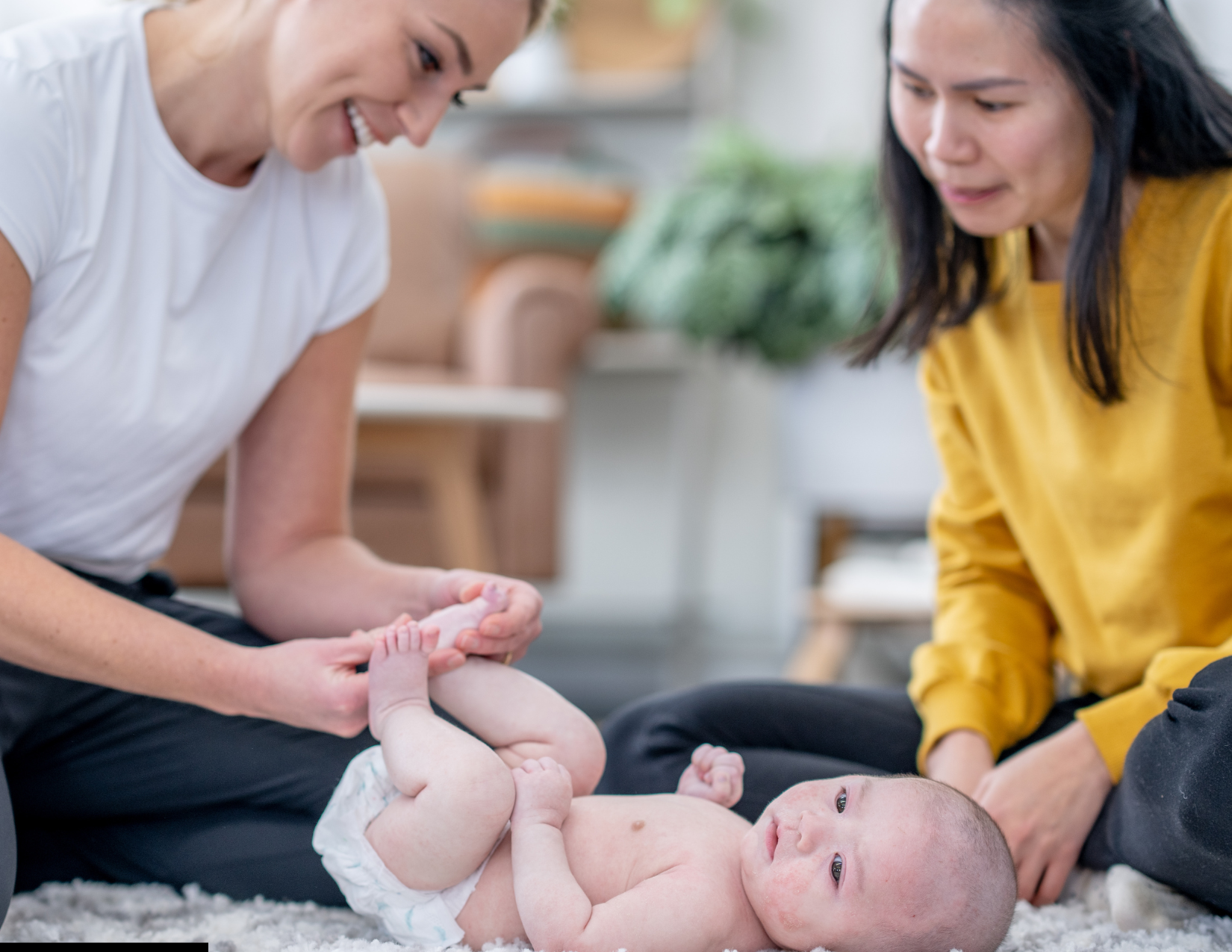 Crossover Postpartum Doula working with client